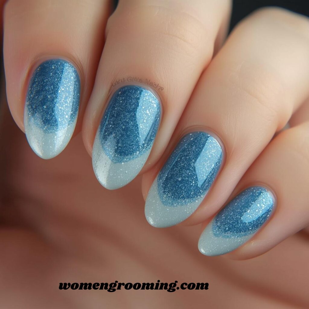 1. Icy Blue Cat Eye Nails (1)
