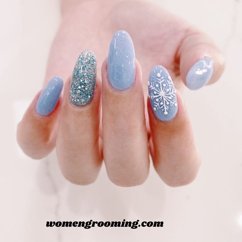 3. Powder Blue Snowflake Nails