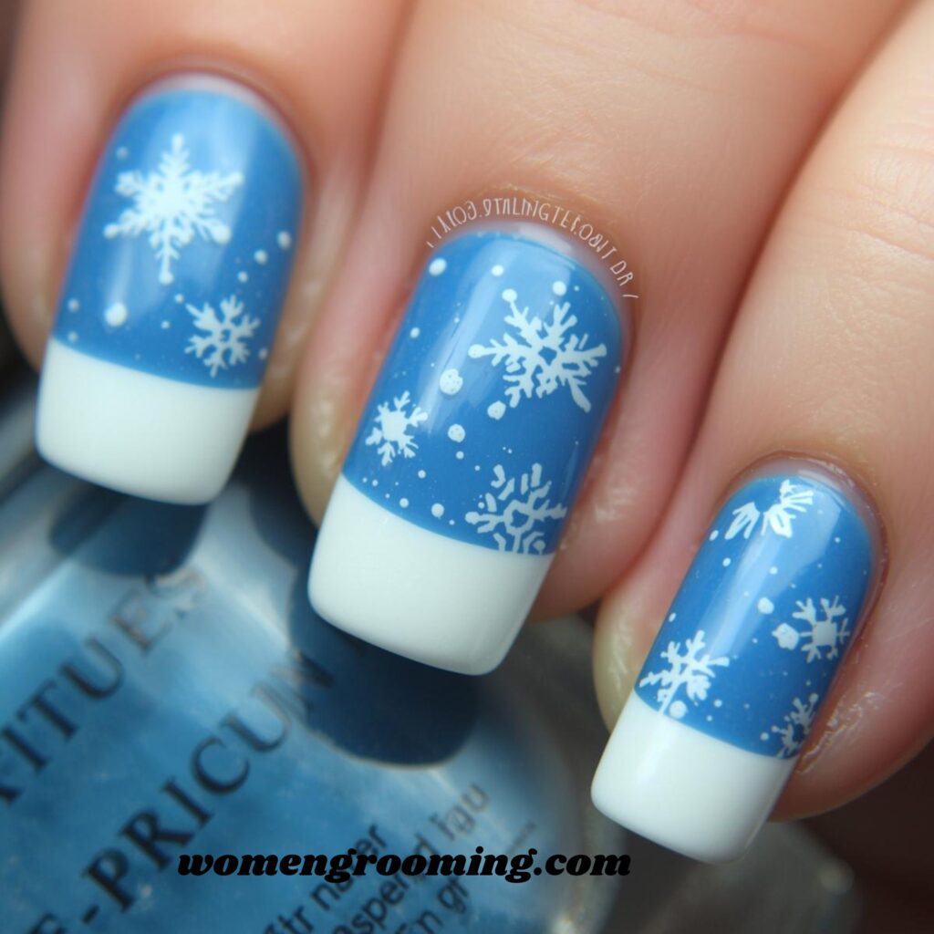 8. Blue French Tips with Snowflakes