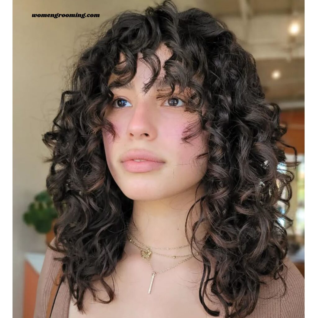 Curly Cut with Face-Framing Layers
